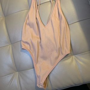 Pink rubbed bodysuit size M